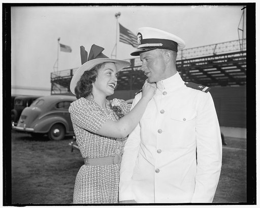 He's in the Navy now. Annapolis, Md. June 1. Lee Dillard Goodsby, a member of the graduating class of the U.S. Naval Academy today, received an added thrill when his girlfriend, Betty Brougher, pinned the epaulets of ensign on his uniform. Ensign Goodsby is a native of Logansport, La., while Miss Br
