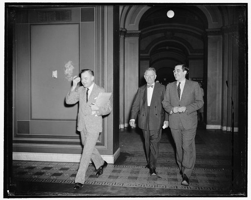 Oldest and youngest Senators leave meeting of isolationist bloc. Washington, D.C., July 7. The isolationist bloc of the Senate met this morning in executive session to lay plans for the coming fight on the Neutrality Bill. Coincidently, the youngest and oldest members of the Senate attended the meet