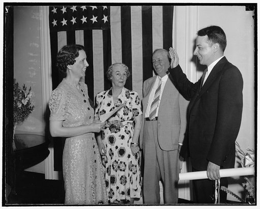 A new Civil Service Commissioner takes oath. Washington, D.C., July 8. Arthur S. Flemming, republican, recently named a member of the United States Civil Service Commission to succeed Samuel H. Ordway Jr., resigned, today was administered the oath of office. Left to right: Mrs. Marjorie D. Hansen, D