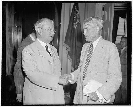Kansas legislator congratulated on 75th birthday. Washington, D.C., July 14. Senator Arthur M. Capper, right, Republican of Kansas, is congratulated on his 75th birthday today [by?] Senator Hiram W. Johnson, veteran Republican from California
