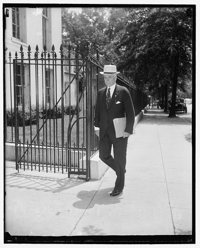 Secretary of State Hull arrives at White House for final conference on neutrality message. Washington, D.C., July 14. Secretary of State Cordell Hull entering a side door of the White House today for a final conference on the neutrality message President Roosevelt transmitted to Congress