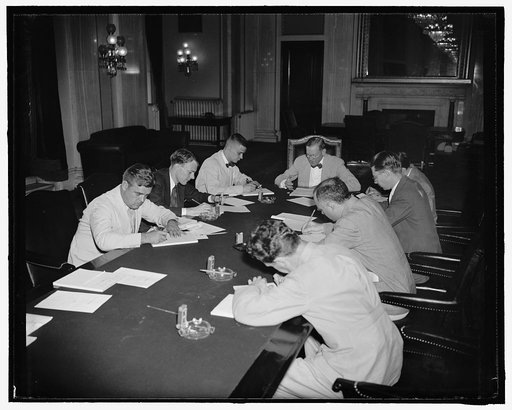 Sen. McNary tells press that Republican Senators want lending bill amended. Washington, D.C., July 20. Senate minority leader Charles McNary seated at the conference table with reporters as he announced results of a Republican conference this morning on Sen. Alben barkley's lending bill. 'The Republ