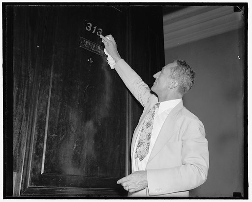 Number 13 proves lucky for New Mexico senator. Washington, D.C., July 26. Senator Carl A. Hatch, Democrat of New Mexico, polishing up his lucky 13 office number. He is one of the few Senators who have succeeded in getting a major bill through both Houses of Congress practically intact this session. 