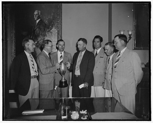 John W. Hanes presents Morgenthau cup, winner of Treasury rifle match