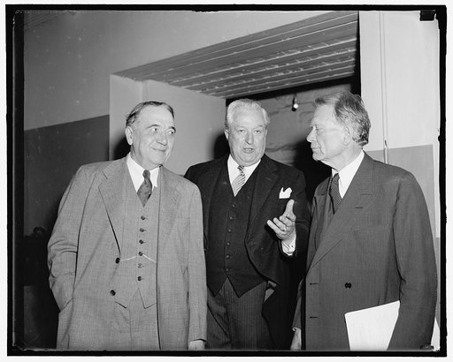 Unidentified persons with Senator William Borah