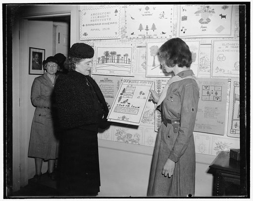 Wife of Acting Navy Secretary views prize winning needlework of girl scouts. Washington, D.C., Nov. 4. Mrs. Charles Edison, wife of the acting Secretary of the Navy was honor guest today at a private showing of prize winning samplers selected from a nation-wide competition among Girl Scouts. The sho