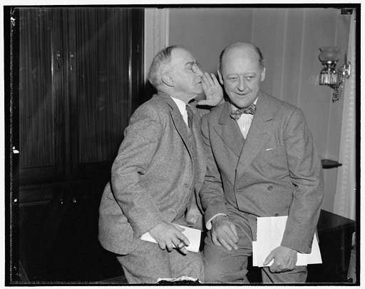 Perfect harmony. Washington, D.C., Nov. 2. Seems that Rep. James W. Wadsworth, Republican of New York, is getting a bit of confidential arms information from Rep. Luther A. Johnson, Democrat of Texas and ranking member of the House Foreign Affairs Committee, just before he--Wadsworth--addressed the 