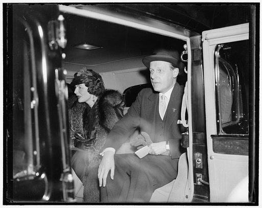 German Charge D'Affaires and wife attend Soviet reception. Washington, D.C., Nov. 7. Herr Hans Thomsen, Charge d'Affaires and Counselor of the German Embassy, and Frau Thomsen, pictured as they arrived at the Soviet Embassy today for the reception given in celebration of the 22nd anniversary of the 