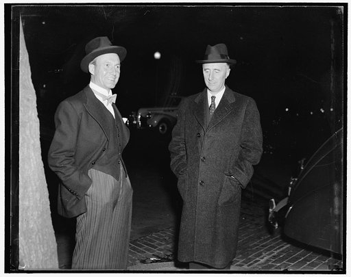 At Soviet reception. Washington, D.C., Nov. 7. Henrik De Kauffmann, left, Danish Minister, and Wilhelm Munthe de Morgenstierne, Norwegian Minister, snapped as they arrived at the Soviet Embassy tonight for the reception tendered by the Charge d'Affaires M. Dmitri Chuvakhin in celebration of the 22nd