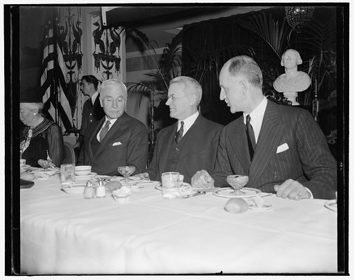 State Department high officials address Inter-American education conference. Washington, D.C., Nov. 9. Secretary of State Cordell Hull, Dr. Isiah Bowman, President of the Johns Hopkins University, and Undersecretary of State Sumner Welles photographed today at the luncheon-meeting of the conference 