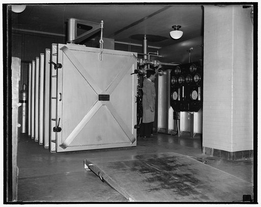 National Archives. Washington, D.C., Nov. 22. After the documents are enclosed in the chamber, all air is drawn out and the gas turned on