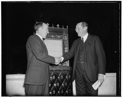 Magna Carta deposited in Congressional Library for duration of war. Washington, D.C., Nov. 28. The most cherished existing copy of the Magna Carta was today deposited in the Congressional Library here for the duration of the war by British Ambassador Lord Lothian. Librarian Archibald MacLeish, left,