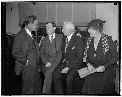 Discuss Repubican Party problems. Washington, D.C., Dec. 7. Snapped in a huddle just before the meeting of the Executive Committee of the Republican National Committee convened today were, left to right: John Hamilton, Chairman of the Republican National Committee; Rep. Joseph W. Martin Jr., House R