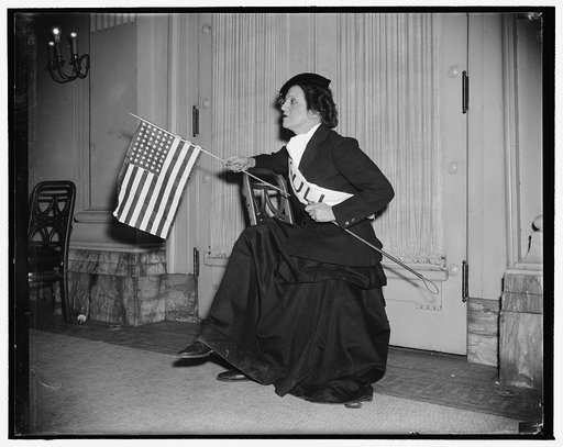 Gridiron widows. Riding side-saddle for dear old Tennessee is Mrs. Cordell Hull, waving a flag and coming down the stretch. She is Helen Essary