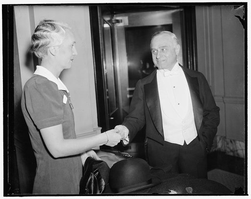 Annual Gridiron dinner. Washington, D.C., Dec. 9. Justice Felix Frankfurter, as he checked his hat and coat before attending the annual Gridiron dinner in honor of the president