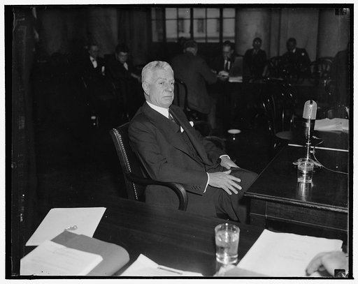 Denies that helping Richard Whitney got him business. Washington, D.C., Dec. 14. Charles E. Mitchell, Chairman of the Board of Blyth and Co. Inc., and former Chairman of the National City Bank of New York, testified before the Federal Monopoly Committee today that he was influential in having George