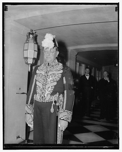 British Ambassador dons full regalia for Diplomatic reception at White House. Washington, D.C., Dec. 14. Lord Lothian, British Ambassador to the United States, snapped as he left the embassy tonight for the Diplomatic reception at the White House