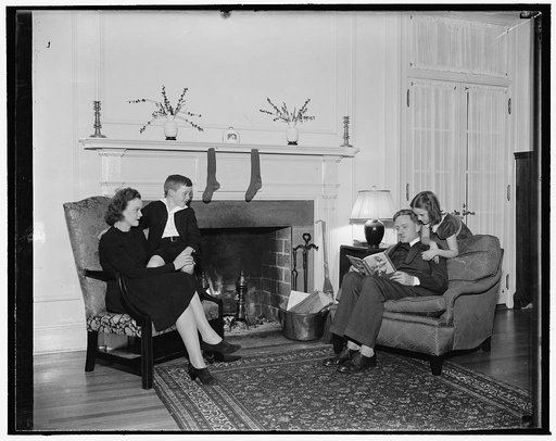 Christmas Eve at home of youngest Supreme Court Justice. Washington, D.C., Dec. 18. Associate Justice of the Supreme Court and Mrs. William O. Douglas with their children, Mildred Riddle, and William O., Jr., will reenact this scene at their home on Christmas Eve