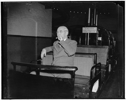 Vandenberg rides alone to opening session of Senate. Washington, D.C., Jan. 3. Senator Arthur H. Vandenberg, Republican of Michigan, using the subway from his office to the Capitol today for the opening session of the 76th Congress