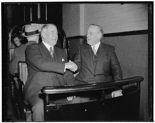 Senators in jovial mood as they arrive for opening session of new Congress. Washington, D.C., Jan. 3. Senate Majority Leader Alben W. Barkley, left, and Senator Alexander Wiley, Republican of Wisconsin, seemed happy that the new session of Congress would convene today as they rode the Senate subway 