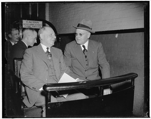 Maybe the Jackson Day dinner invitation. Washington, D.C., Jan. 3. They could be discussing the invitation Senator Warren R. Austin, right, Republican of Vermont and Senate Minority Leader, received for the Jackson Day dinner. At any rate, Senator George L. Radcliff, left, and Senator Austin seem to