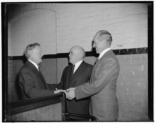 Returning Senators greet one another. Washington, D.C., Jan. 3. Republican Senator William E. Borah, left, seemed happy to see Democratic Senator John H. Bankhead, center, and Millard E. Tydings, as he met them in the Senate subway on their way to today's opening session of the 76th Congress