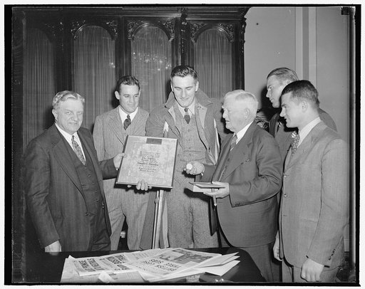 Vice President John N. Garner and group; with award: Athletic Round table certificate to Donald G. Herring, winner of National Sportsmanship Award for 1939