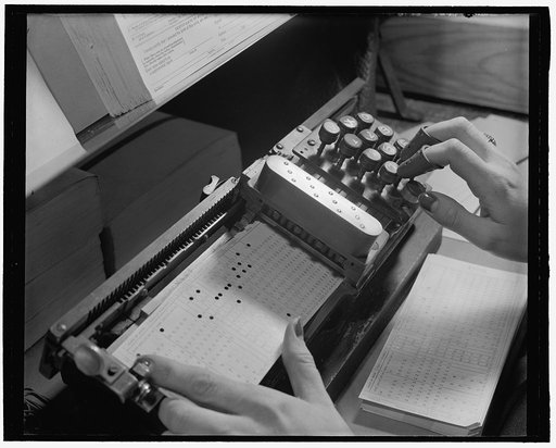 Woman working with a tabulating machine at the US Census Bureau
