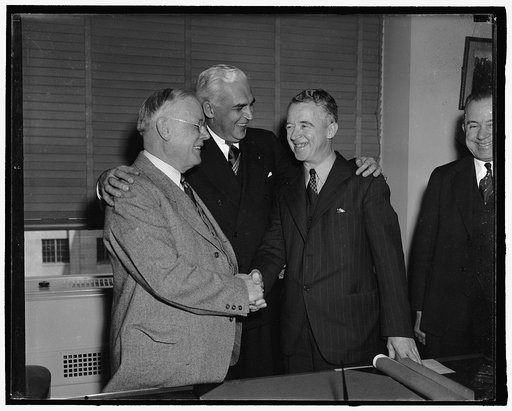 The C.C.C. swears in new director. Washington, D.C., March 7. While William Green, president of the AF of L, and Federal Security Administrator Paul V. McNutt, look on, James J. McEntee today toook the oath of office, as administrator of the Civillian Conservation Corps. Left to right: Green, McNutt