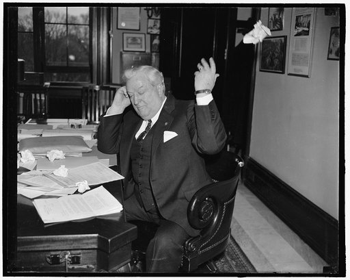 Making out income tax perplexing problem to Nevada senator. Washington, D.C., March 11. Political issues and congressional problems were forgetten today by Senator Pat McCarran, Democrat of Nevada, when he tackled his income tax report due in a few days, March 15 to be exact. A look of disgust and u
