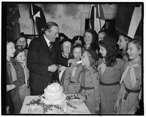 British Ambassador assists Girl Scouts at 28th anniversary party. Washington, D.C., March 12. Lord Lothian, British ambassador to the United States, came to be entertained, but instead, entertained the girl scouts at their headquarters here today on the occasion of the 28th anniversary of the foundi