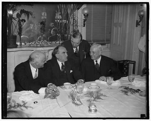 William Bankhead and group at table