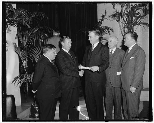Group, includes Robert Jackson, 2nd from left; and J. Edgar Hoover, right
