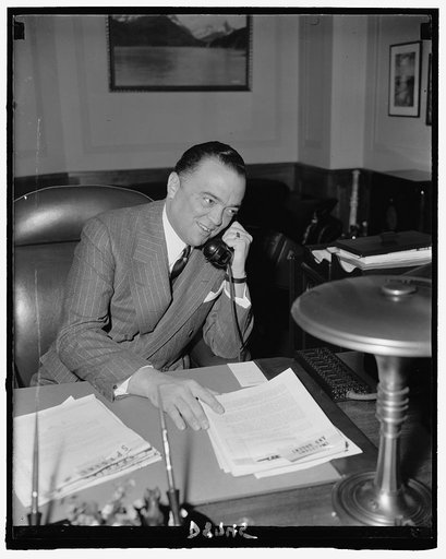 J. Edgar Hoover, Dir. of F.B.I., in his office, April 1940