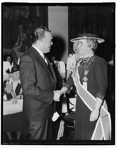 J. Edgar Hoover, left