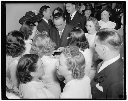 J. Edgar Hoover surrounded by group