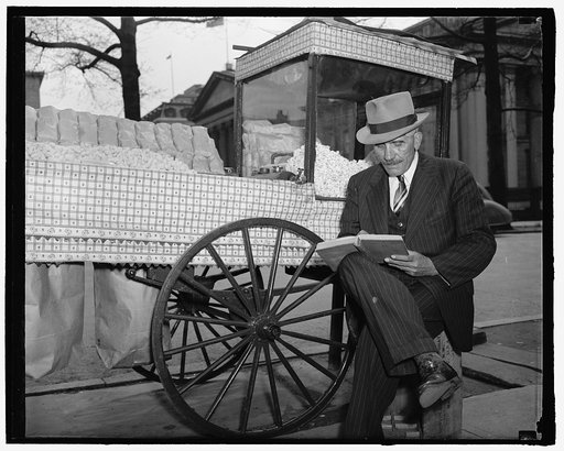 Steve Vasilakas, White House peanut vendor, with Treasury Building in the background