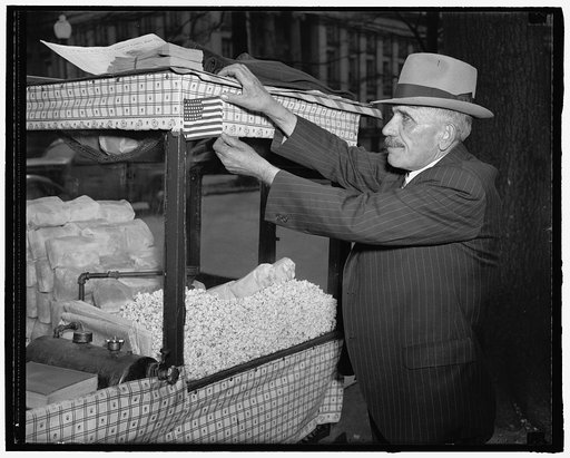 Steve Vasilakas, White House peanut vendor, with Treasury Building in the background