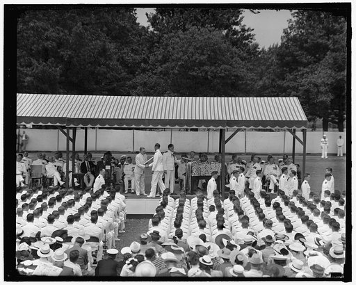 United States Naval Academy graduation. Washington, D.C., June 6. The United States Naval Academy, Annapolis, Maryland, held its 1940 graduation exercises today. Principal address to the graduates was delivered by Charles Edison, Secretary of the Navy, who is shown in this picture giving a diploma t