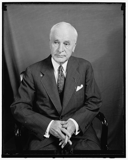 Secy. of State Cordell Hull at his desk, 7-12-40