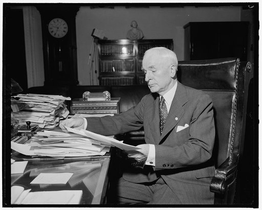 Secy. of State Cordell Hull at his desk, 7-12-40