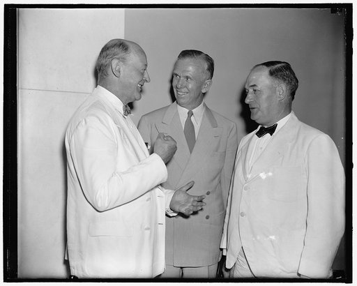 Gen. George C. Marshall (center) with two unidentified men