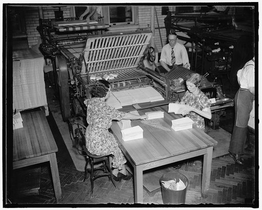 Folding unemployment blanks. Washington, D.C., Oct. 7. Coming off the press at the rate of 3,000,000 a day, the unemployment census questionnaires are automatically folded and then bundled for delivery to the post office, 10/7/37
