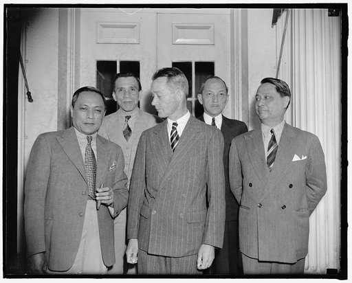 Amb. McMurray. Philippine [...] Parades, John Van(?) A. McMurray, Manual Noyas, [...], Jose Romero, Benito Razon