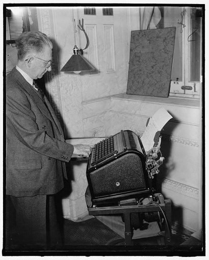 New time saving voting machine designed to U.S. Capitol employee. Washington, D.C., May 10. Until Jurgensen, Jr., a tally clerk in the House of Representatives designed this electric voting machine it took at least three months, using the old rubber stamp system, to compile the voting records of the