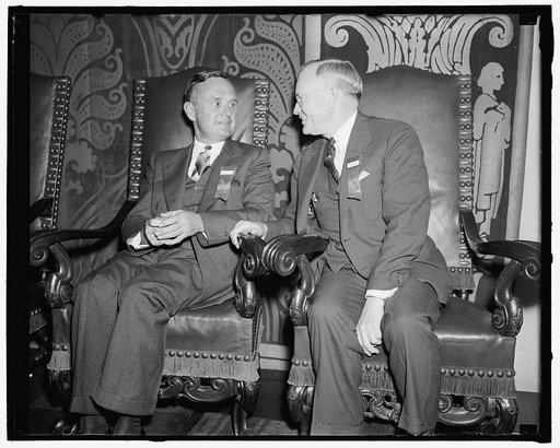 Agree. Washington, D.C., May 3. B.O. Heacock, (left) a director, and George H. Davis, President of the United States Chamber of Commerce, today joined hands in defending the capitalistic system of free enterprise as contrasted with other systems employing so-called "planned economies," 5/3/38