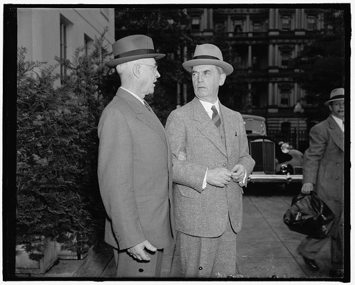 Discuss sale of helium to Germany with President Roosevelt. Washington, D.C., May 11. U.S. Chief of Staff Malin Craig, (left) and Admiral William D. Leahy, chief of Naval operations, leaving the White House today after a discussion with President Roosevelt and other high government officials regardi