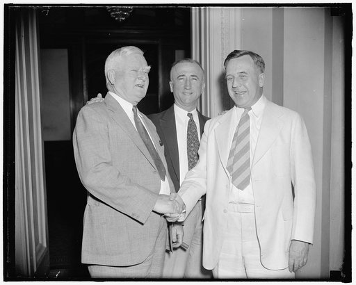 Congratulations! Washington, D.C., June 16. Vice President Garner congratulating Senator Prentiss M. Brown, Michigan, on his appointment as Chairman of the Democratic Senatorial Campaign Committee. Senator James F. Byrnes, South Carolina, is in center, 6/16/38