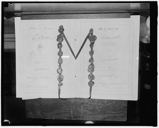 Nine-Power Treaty. [Washington] D.C., Oct. 14. The signature page of the [...] [passed?] Nine Power Treaty signed at the [...] conference at Washington in 1922. [...] Hyde Parks says President Roosevelt has [...] to send a representative to the Nine Power [...] at Brussels which is expected to conve
