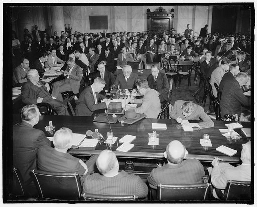 TVA Congressional investigation gets under way Washington, D.C., May 25. Seats were at a premium today as the Joint Congressional Committee opened hearings on the Tennessee Valley Authority investigation at the Capitol. This picture, taken from back of the committee room with Dr. Arthur E. Morgan, (